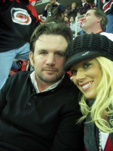 My husband and I at a Hockey Game!  GO CANES!!